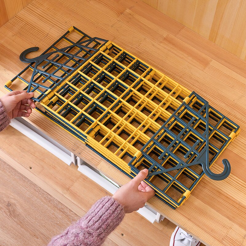 Folding hanging storage rack